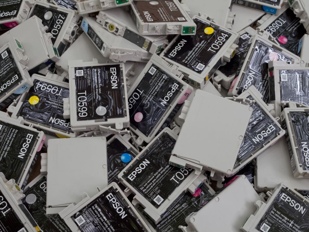 A pile of used ink cartridges 